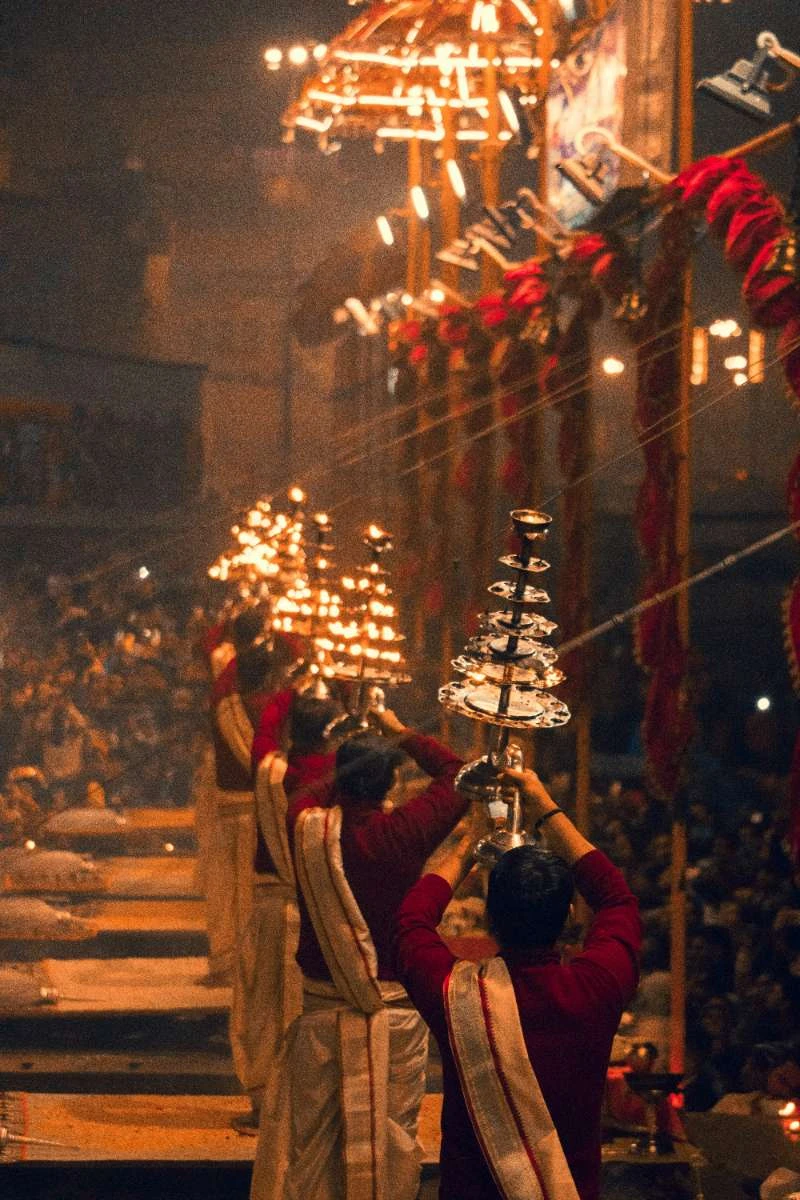 Hindu priests performing evening Ganga Aarti at Varanasi Ghats